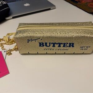 Betsey Johnson Gold Butter Stick Wristlet